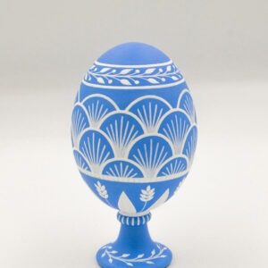 This is a white and blue hand-painted goose egg. A collection of hand-painted eggshells.