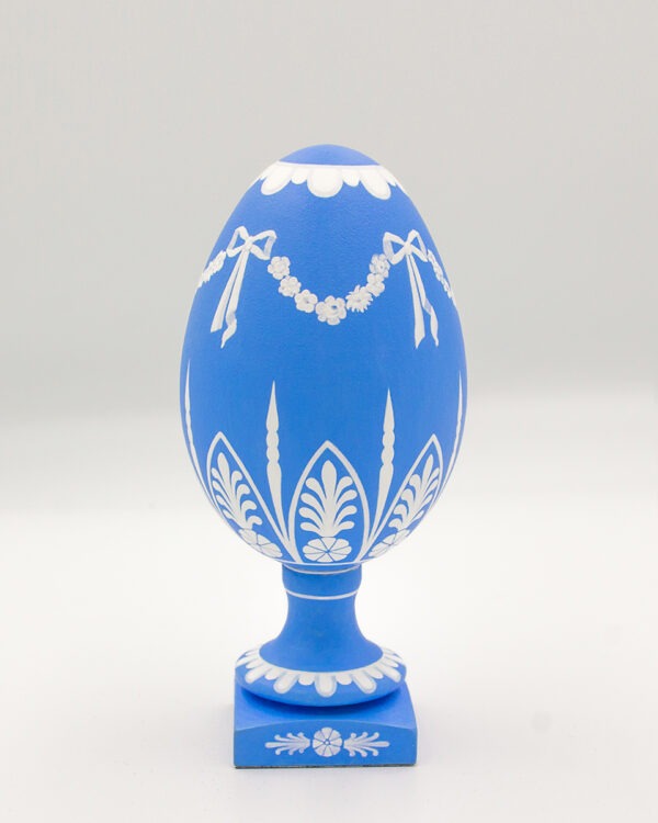 This is a white and blue handpainted goose eggshell