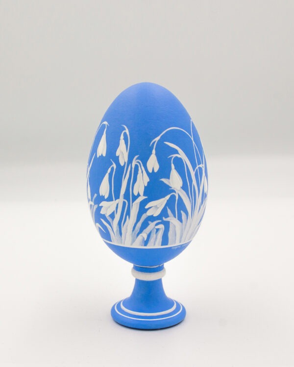 This is a white and blue handpainted goose eggshell